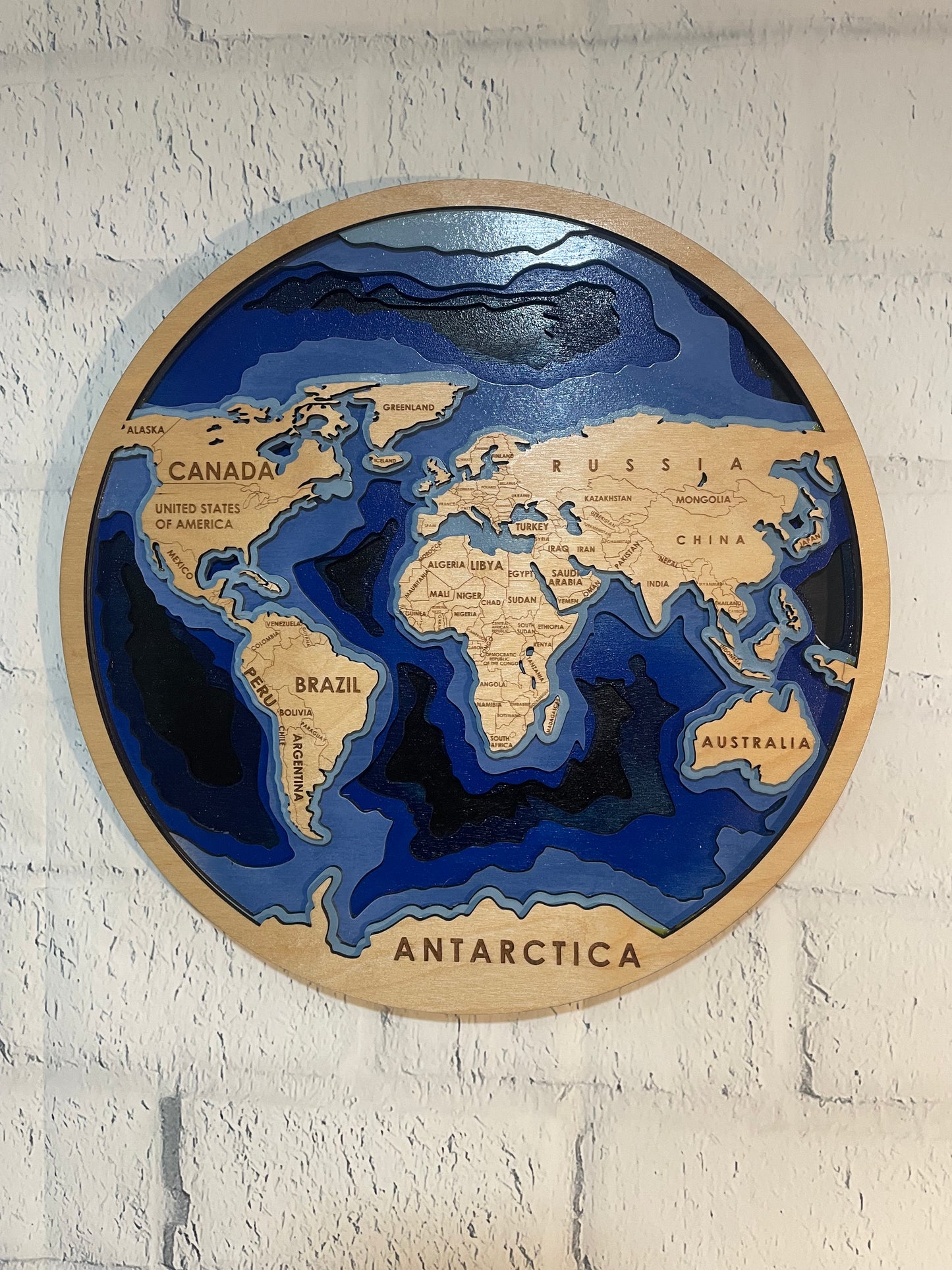 3D Wood World Map | Round Laser-Cut Multi-Layer Ocean Bathymetric Wall Art
